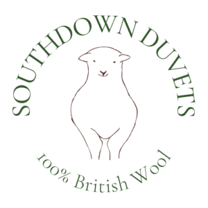 Southdown Duvets 100% British Wool logo with sketch of sheep
