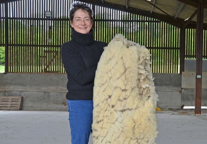 Jessica, owner of Southdown duvets holding Southdown fleece